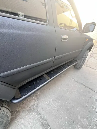Силовые пороги Hilux Surf